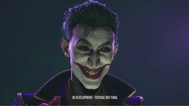 Suicide Squad: Kill the Justice League Joker screenshot showing a man with a painted clown face smiling creepily.